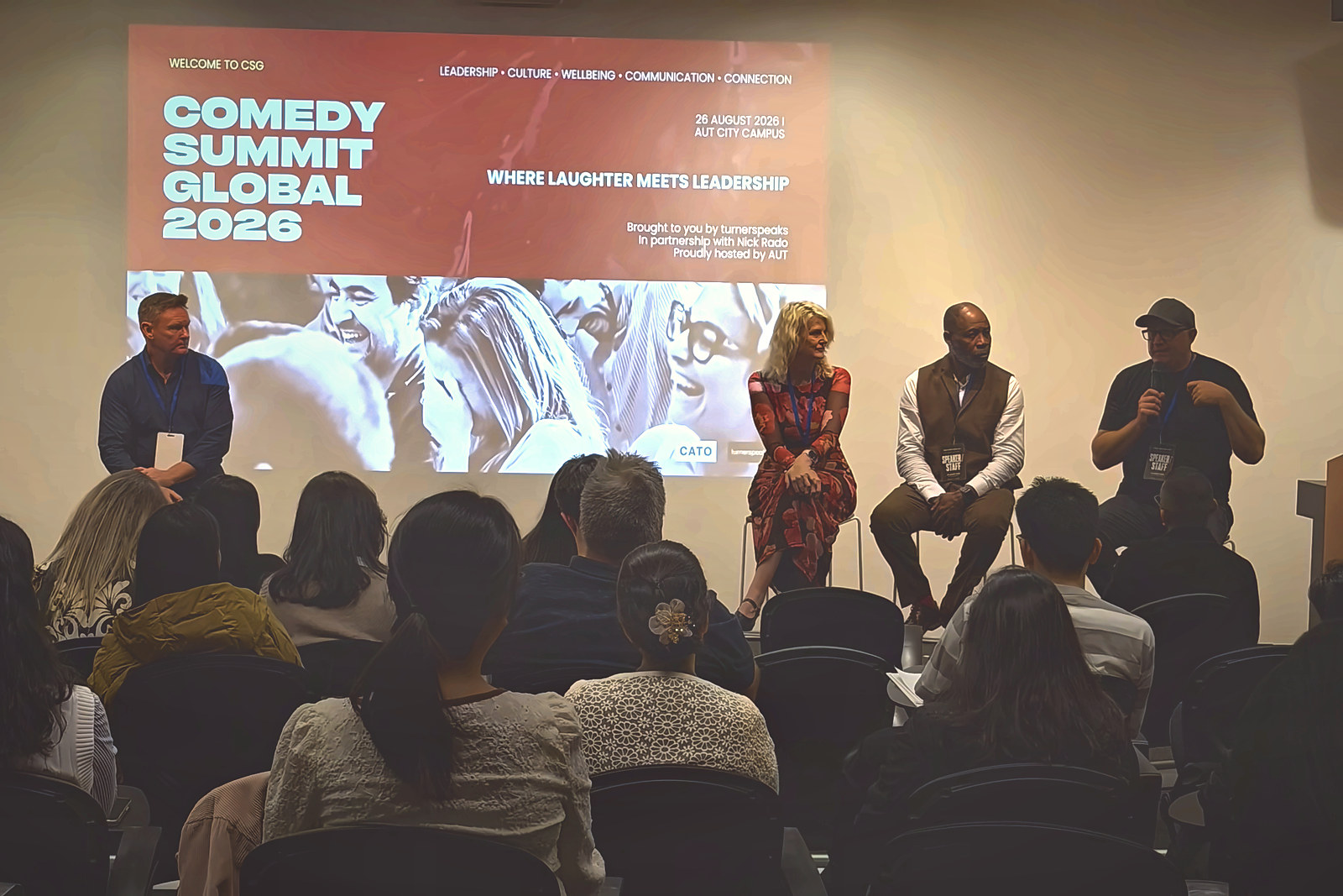 A panel discussion on stage at Comedy Summit Global 2026